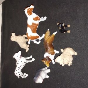 Animal figures lot of 7 PVC / plastic dogs. Shepherd Dalmatian Setter